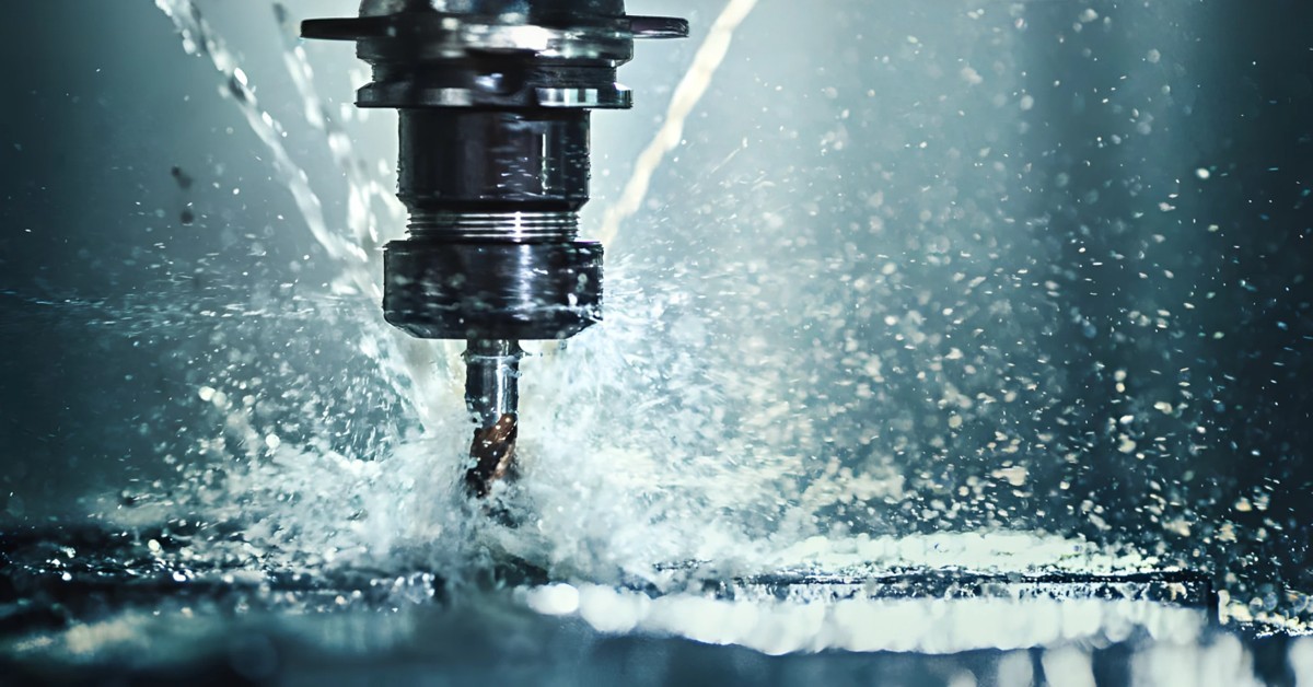 CNC machining with coolant spray