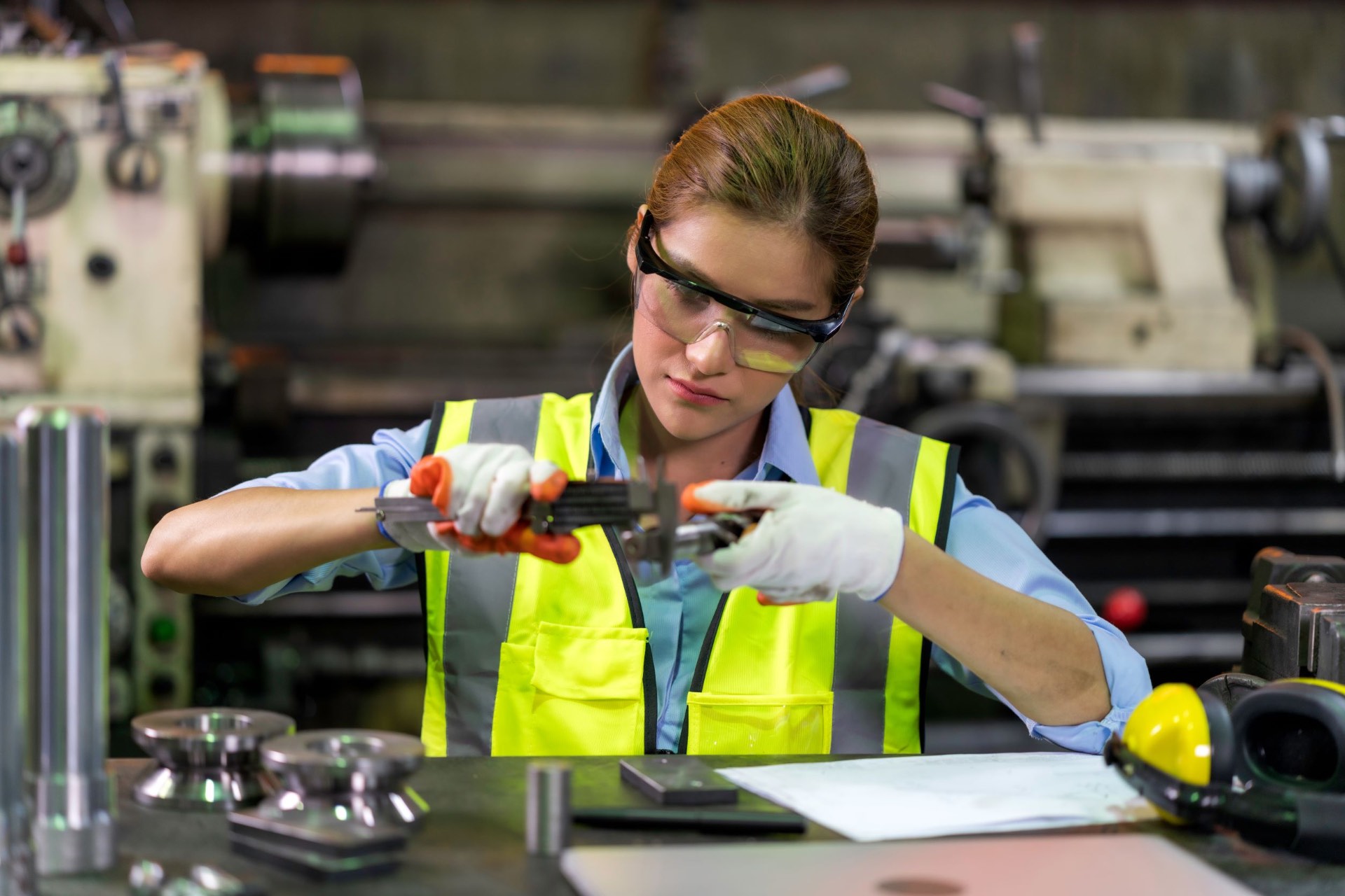 Quality technician performing precision measurements